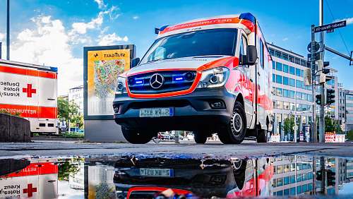 traffic light white and red Mercedes-Benz ambulace transportation